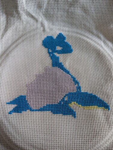 a picture of a cross stitch of Lapras from Pokemon